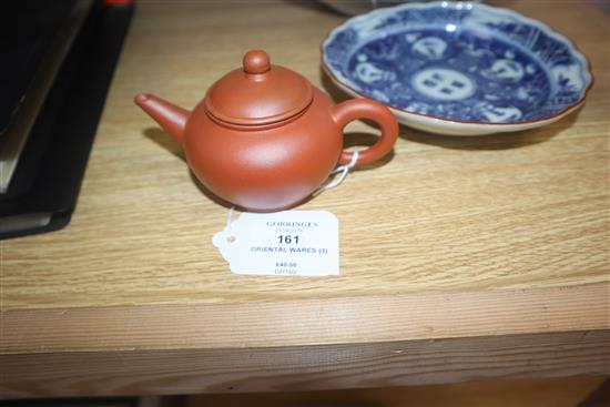 A Chinese Yixing teapot, a Chinese blue and white plate and a Japanese dish (3)